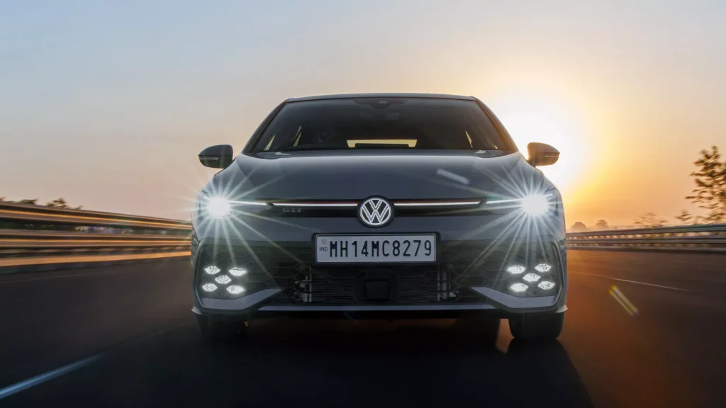 Volkswagen Golf GTI front view with illuminated logo and red GTI accents