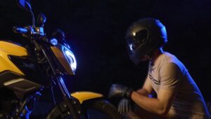 TVS Raider 125 in yellow Colour Showcasing LED Headlamp and Sporty Design