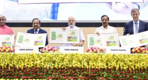 PM Modi and Acharya Prashant on World Environment Day 2025 with tree plantation visuals