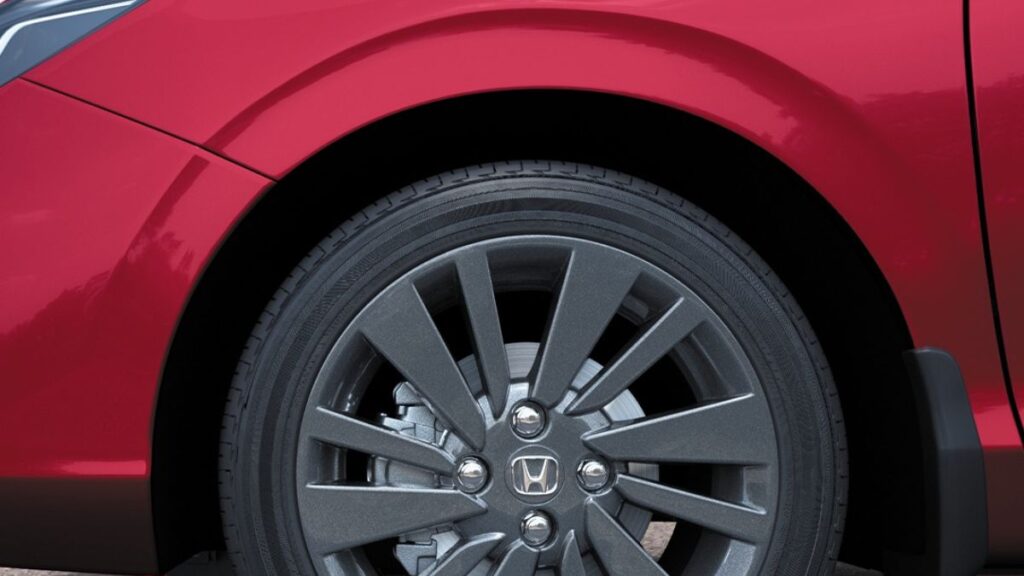 Side profile of Honda City Sport Edition 2025 with shark fin antenna and metallic grey alloy wheels