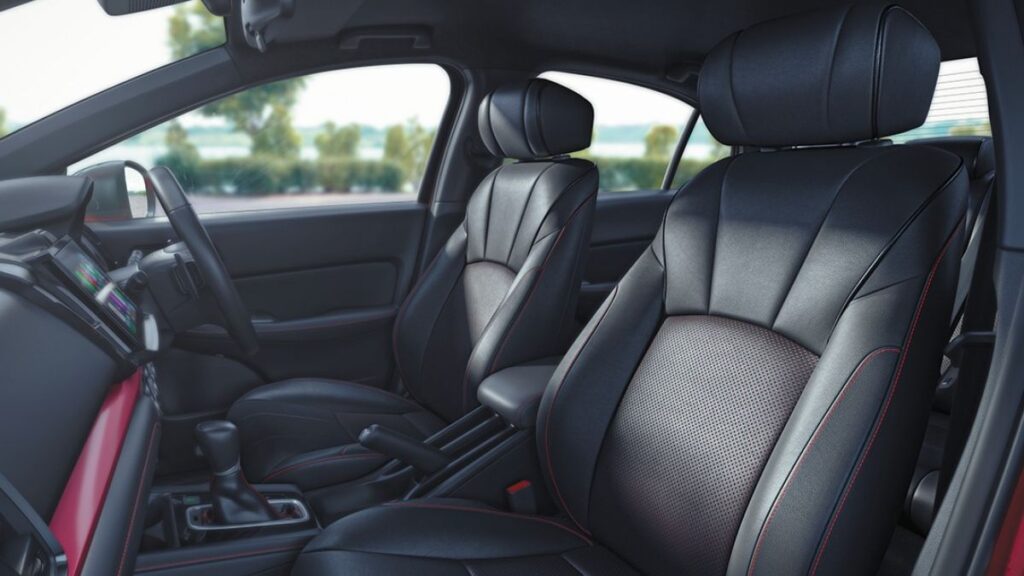 All-black interior of Honda City Sport Edition 2025 featuring red stitching and ambient lighting
